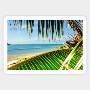 Tropical beach scene with palm fronds. Sticker
